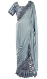 This blouse is paired with a smooth shimmering Saree,just watch you light up the night!