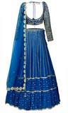 Blue, designer lehenga with shimmering embroidery by Vvani by Vani Vats with shimmering embroidery