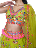 Green organza lehenga by Preeti S Kapoor with matching short blouse & mirror work all over